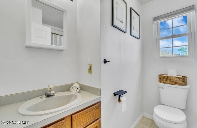 650 Drum Point Rd, Brick, NJ 08723 - bathroom featuring toilet, tile patterned floors, baseboards, and vanity