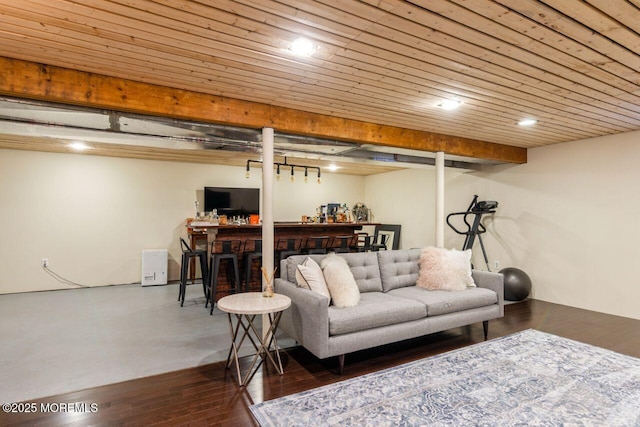 living room featuring wood ceiling, a dry bar, and wood finished floors