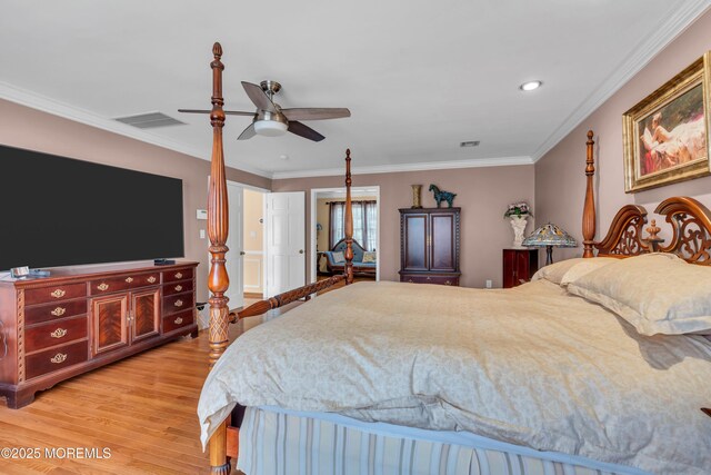 bedroom with crown molding, recessed lighting, visible vents, and light wood-type flooring