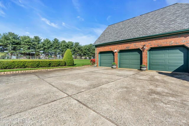 garage with driveway