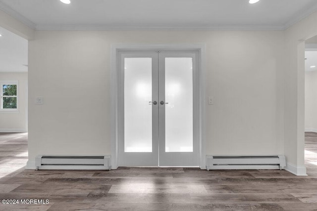 doorway featuring a baseboard radiator, recessed lighting, crown molding, and wood finished floors