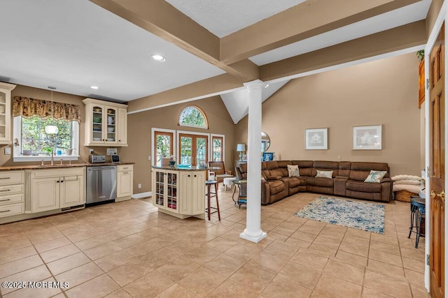 living room featuring baseboards, ornate columns, recessed lighting, vaulted ceiling with beams, and light tile patterned floors