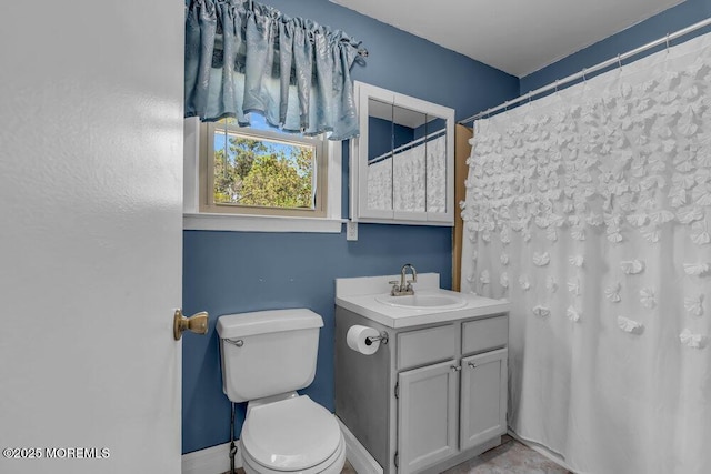full bathroom with toilet, a shower with curtain, and vanity