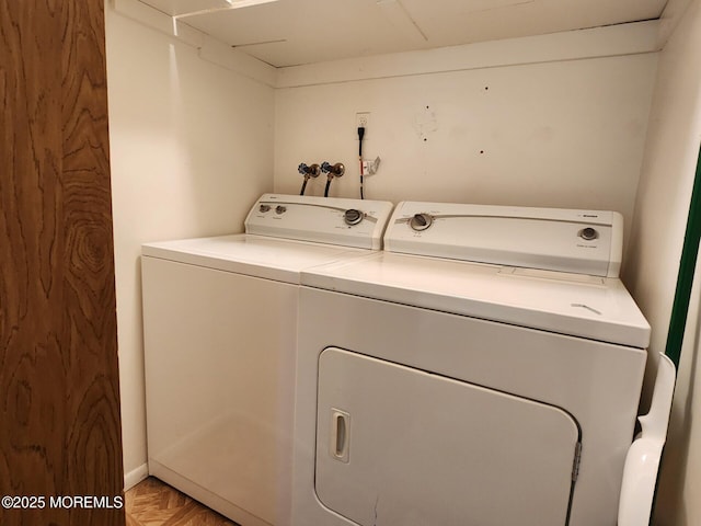 laundry area with laundry area and independent washer and dryer