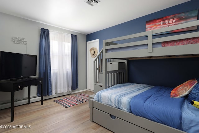 471 Saint Thomas Dr, Toms River, NJ 08757 - bedroom featuring baseboards, visible vents, and wood finished floors