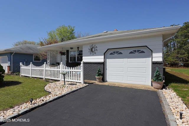 471 Saint Thomas Dr, Toms River, NJ 08757 - ranch-style house with fence, an attached garage, brick siding, a front yard, and driveway