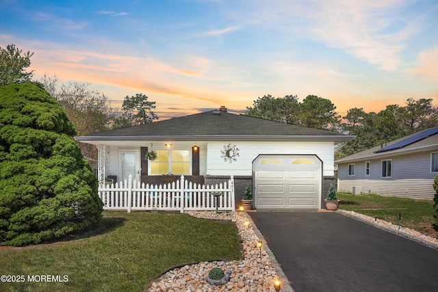 471 Saint Thomas Dr, Toms River, NJ 08757 - view of front facade featuring fence, brick siding, and aphalt driveway