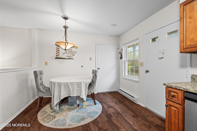 119B Buckingham Dr, Lakewood, NJ 08701 - dining area with baseboards, dark wood finished floors, and baseboard heating