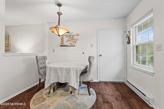 119B Buckingham Dr, Lakewood, NJ 08701 - dining area featuring baseboards, a baseboard heating unit, and wood finished floors