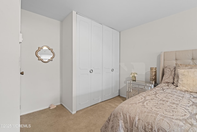 119B Buckingham Dr, Lakewood, NJ 08701 - bedroom featuring baseboards, a closet, and light carpet