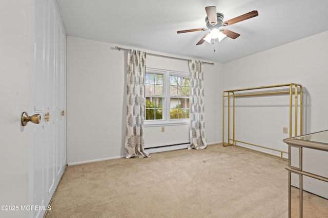 119B Buckingham Dr, Lakewood, NJ 08701 - unfurnished bedroom with baseboards, ceiling fan, baseboard heating, and carpet