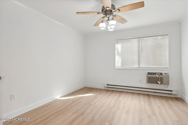 87 Arrowood Rd Unit D, Manalapan, NJ 07726 - empty room with crown molding, baseboards, ceiling fan, baseboard heating, and light wood-type flooring