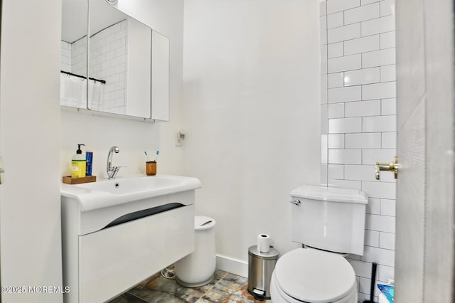 103 Carr Ave, Keansburg, NJ 07734 - bathroom featuring toilet, baseboards, and vanity