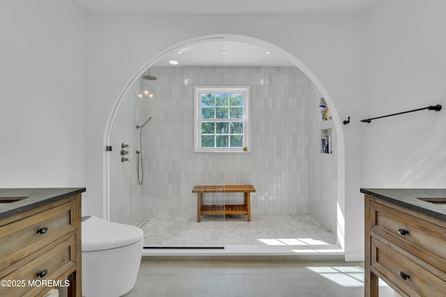 63 Carriage Hill Dr, Colts Neck, NJ 07722 - full bathroom featuring vanity, toilet, and tiled shower