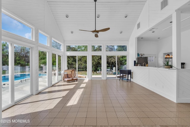 63 Carriage Hill Dr, Colts Neck, NJ 07722 - sunroom / solarium with visible vents, tile patterned flooring, and high vaulted ceiling