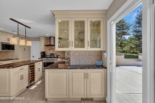 63 Carriage Hill Dr, Colts Neck, NJ 07722 - kitchen featuring wall chimney range hood, tasteful backsplash, wine cooler, dark stone counters, and stainless steel appliances