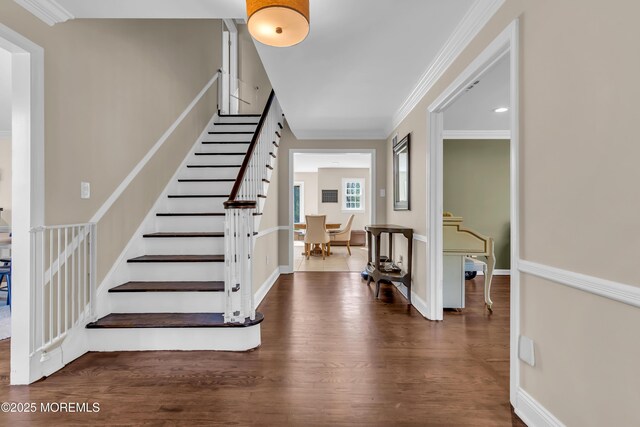 63 Carriage Hill Dr, Colts Neck, NJ 07722 - foyer with stairway, baseboards, ornamental molding, and wood finished floors