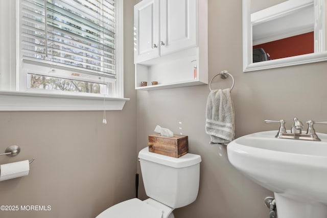 bathroom with a sink and toilet