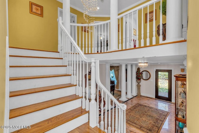 1 Flintlock Rd, Freehold, NJ 07728 - stairs featuring ornamental molding and a notable chandelier