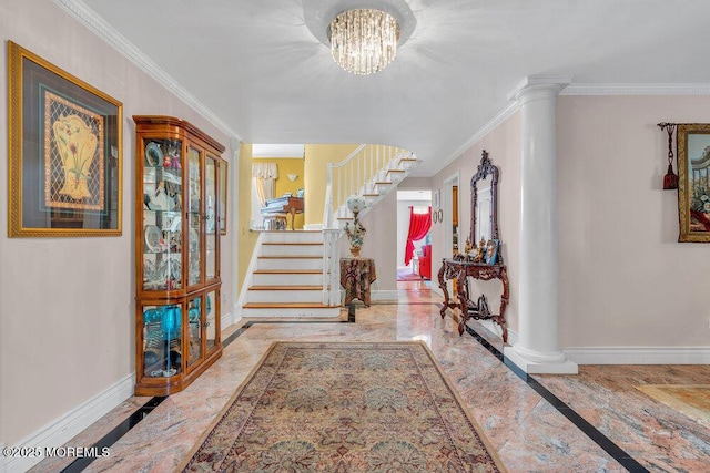 1 Flintlock Rd, Freehold, NJ 07728 - entryway with crown molding, an inviting chandelier, marble finish floor, stairs, and baseboards