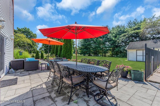 1 Flintlock Rd, Freehold, NJ 07728 - view of patio / terrace with outdoor dining space and an outbuilding