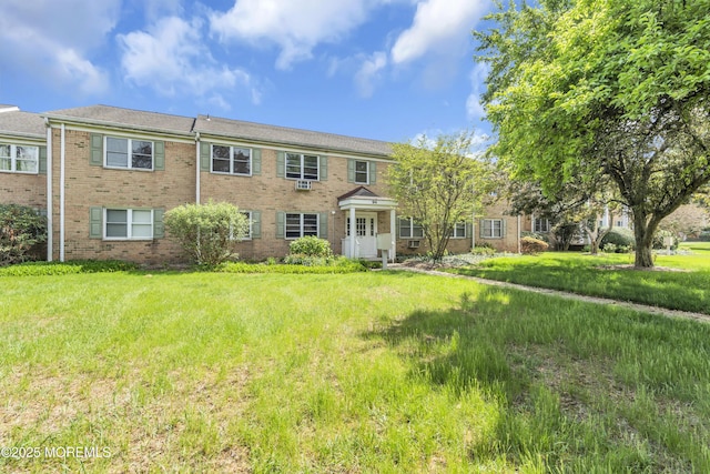 view of front of house with brick siding
