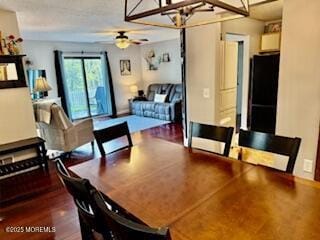 dining space with a ceiling fan