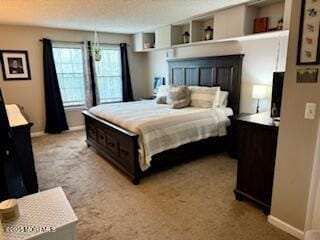 bedroom featuring baseboards and light colored carpet