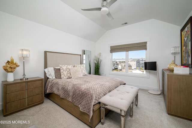 bedroom with ceiling fan, light colored carpet, baseboards, lofted ceiling, and visible vents