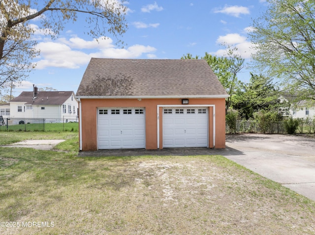 detached garage with fence