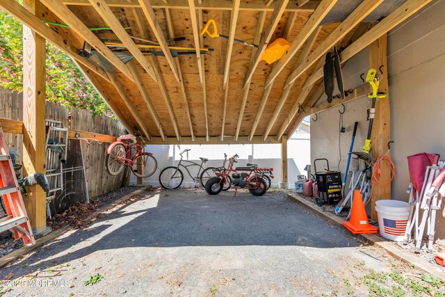 garage featuring fence