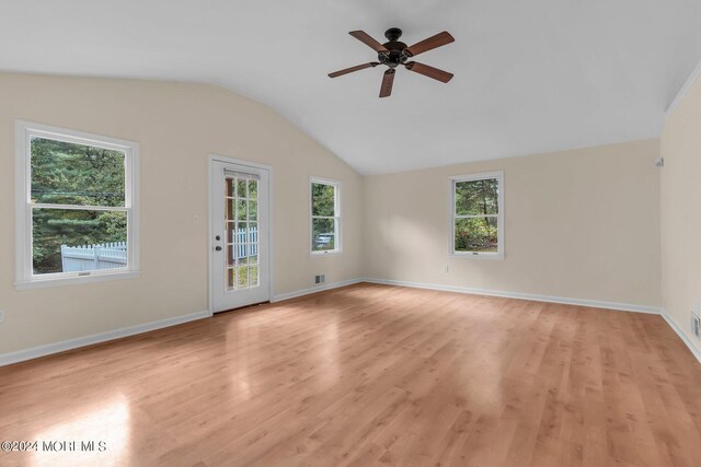 188 Five Points Rd, Colts Neck, NJ 07722 - empty room featuring a ceiling fan, light wood finished floors, a wealth of natural light, and vaulted ceiling