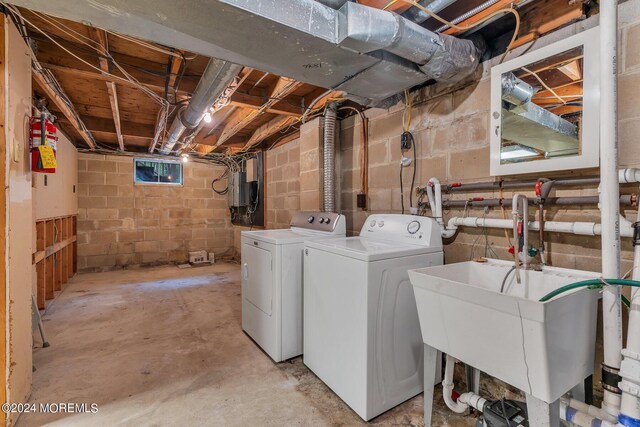 188 Five Points Rd, Colts Neck, NJ 07722 - clothes washing area featuring separate washer and dryer, laundry area, and a sink