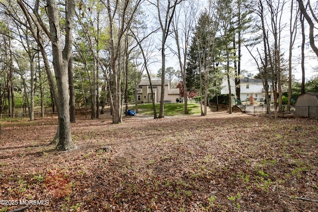view of yard with fence