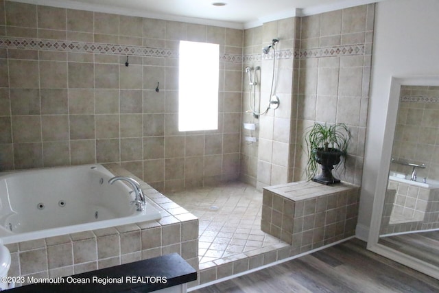 23 Layton Ave, Pine Beach, NJ 08741 - bathroom with tiled shower, wood finished floors, and a whirlpool tub