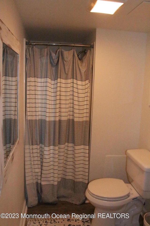 23 Layton Ave, Pine Beach, NJ 08741 - full bath featuring toilet, curtained shower, and baseboards