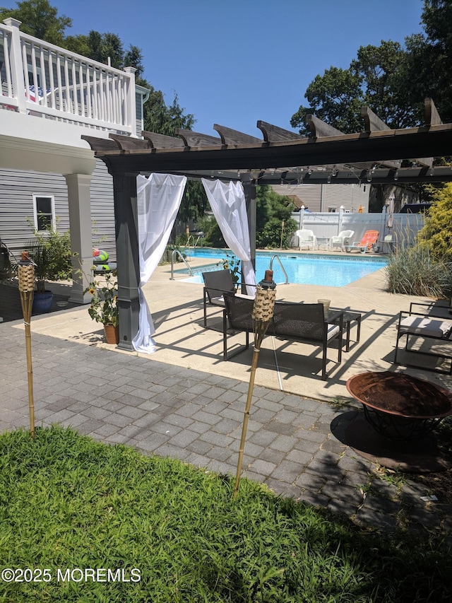 23 Layton Ave, Pine Beach, NJ 08741 - view of patio / terrace featuring a pergola, a balcony, an outdoor fire pit, and fence