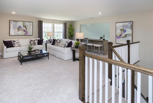 living room featuring carpet floors and recessed lighting