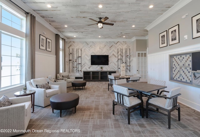 dining room featuring crown molding, ceiling fan, a decorative wall, and recessed lighting
