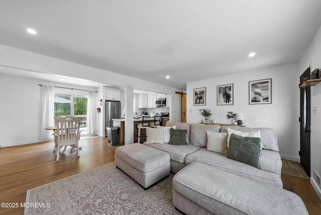 113 Darien Rd, Howell, NJ 07731 - living area with wood finished floors, recessed lighting, and baseboards