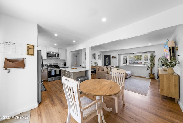 113 Darien Rd, Howell, NJ 07731 - dining area featuring light wood-type flooring, recessed lighting, and baseboards