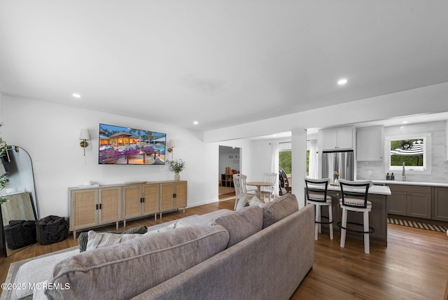 113 Darien Rd, Howell, NJ 07731 - living area with recessed lighting, plenty of natural light, wood finished floors, and ornate columns
