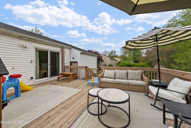 113 Darien Rd, Howell, NJ 07731 - wooden deck with an outdoor hangout area