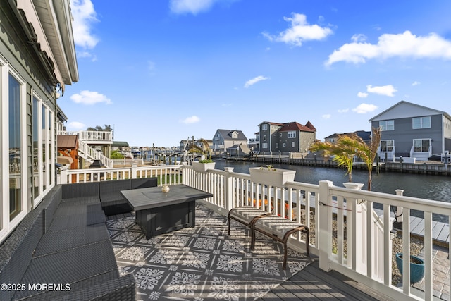 exterior space with a water view and a residential view