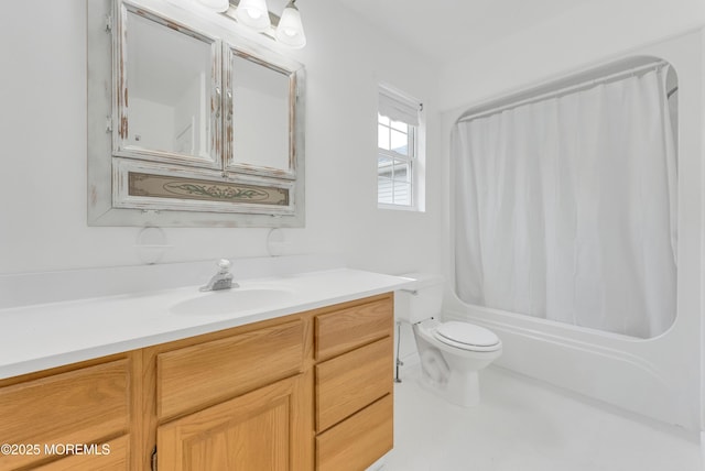 bathroom with shower / tub combo with curtain, vanity, and toilet