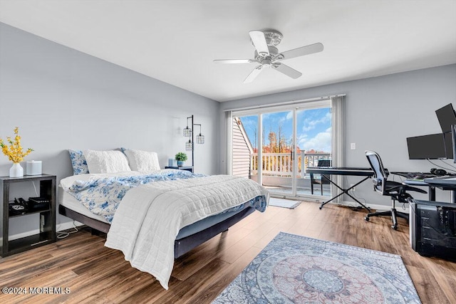bedroom with access to outside, a ceiling fan, and wood finished floors