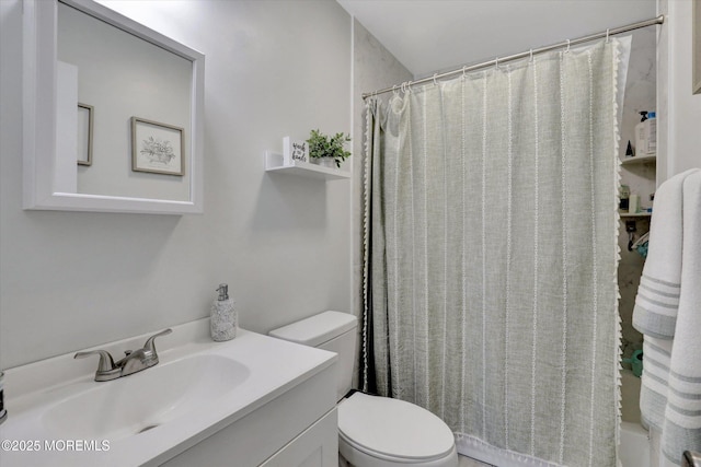 full bathroom with vanity and toilet