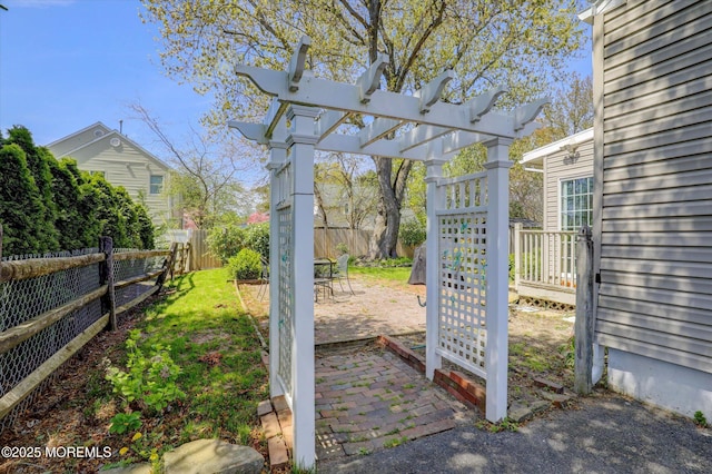 view of patio with a pergola and a fenced backyard