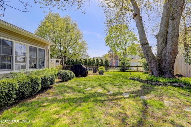 view of yard featuring cooling unit and a fenced backyard