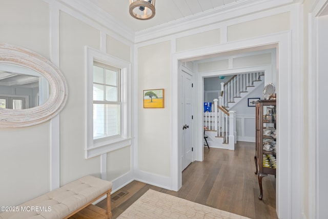 26 Bridge, Bay Head, NJ 08742 - entrance foyer featuring wood finished floors, stairs, and ornamental molding